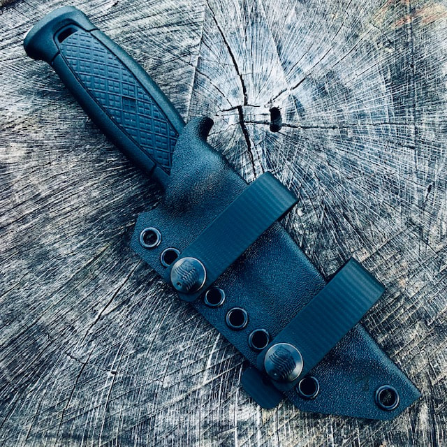 Custom Kydex sheath for the Mora KANSBOL and Leather offset drop belt attachment 